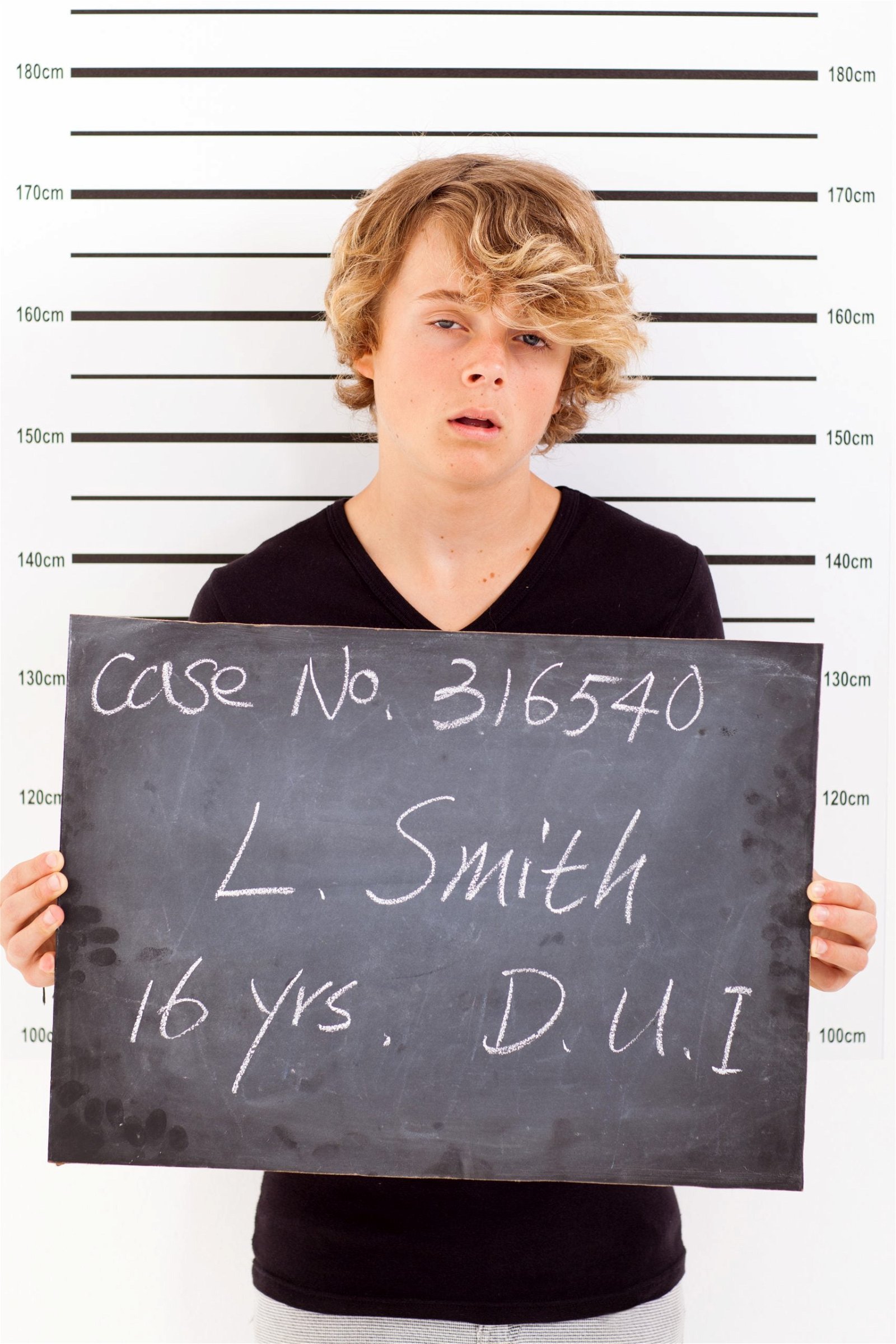 teen boy get arrested for drunk driving and taking police mug shot